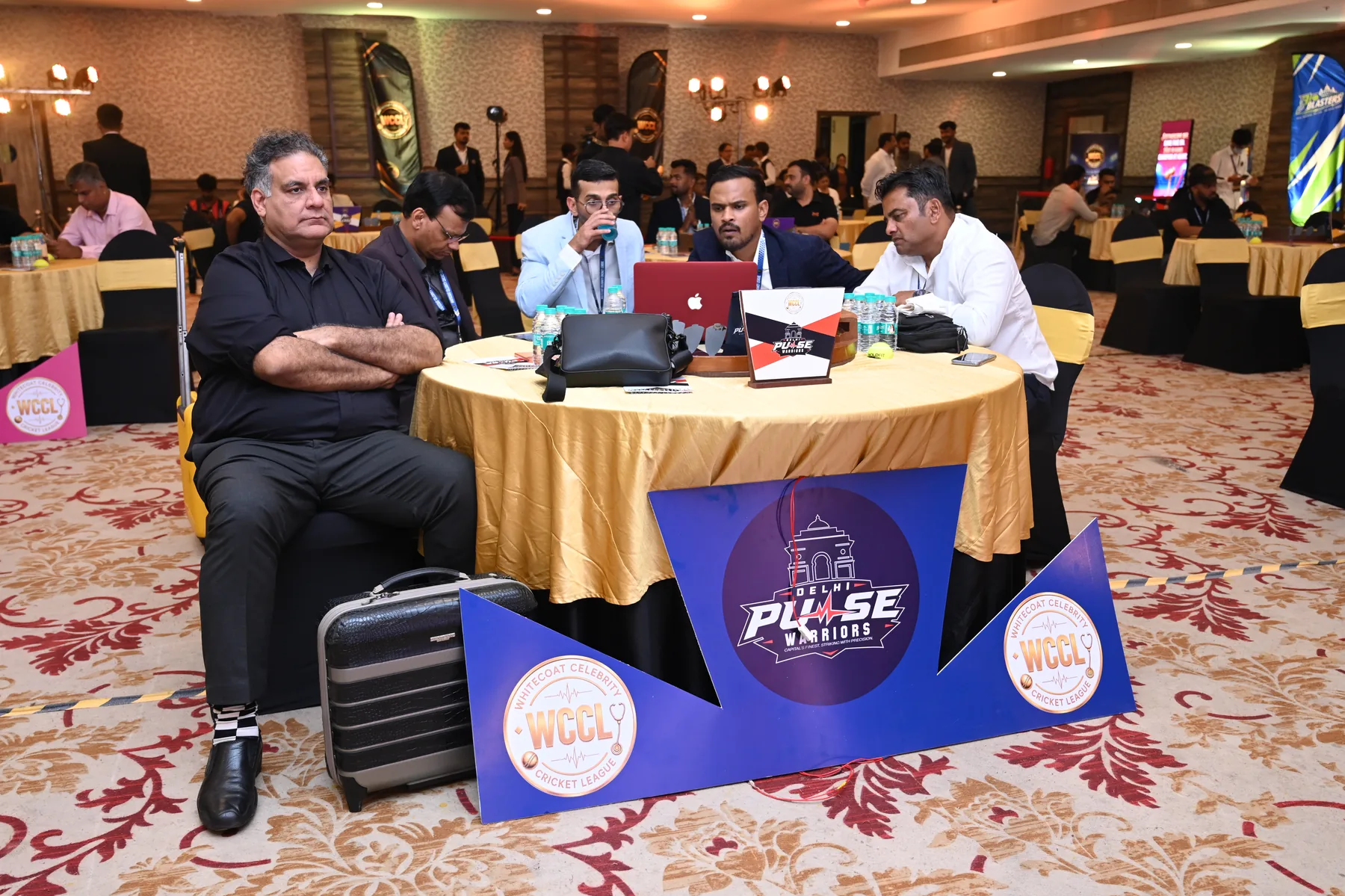 Franchise representatives at the Delhi Pulse Warriors auction table